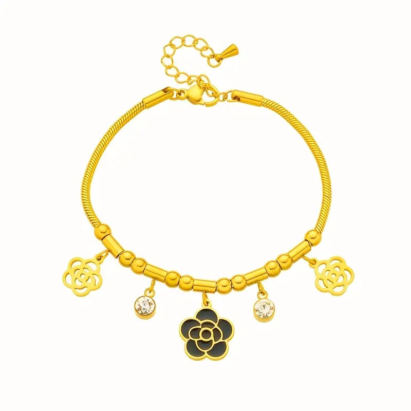 Vintage-style stainless steel bracelet with flower pendants