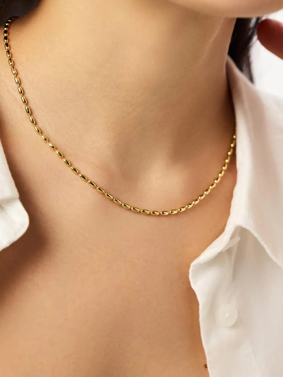 Minimalist gold necklace with beads